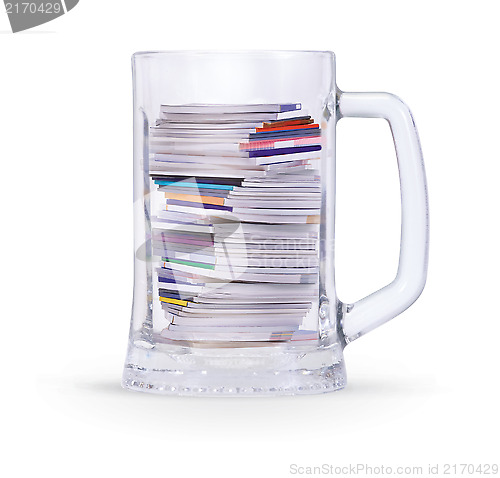 Image of mug of pile magazines