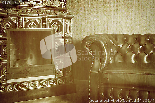 Image of Chair And Fireplace