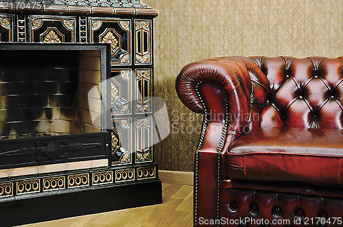 Image of Chair And Fireplace