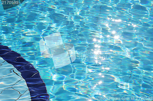 Image of Sparkling clear blue water in swimming pool