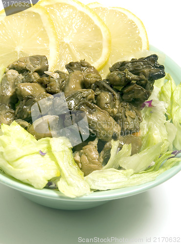 Image of smoked oyster salad  lemon slices lettuce
