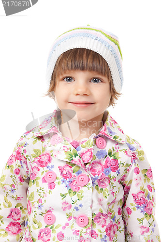 Image of Portrait of a charming little girl in a cap