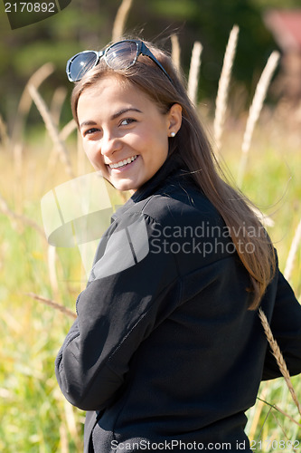 Image of Portrait of a girl in the ears of sunglasses