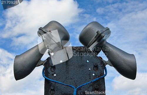 Image of Outdoor public address loudspeakers against a blue sky