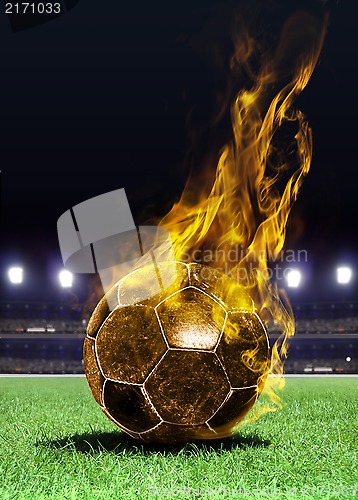 Image of fiery soccer ball on field