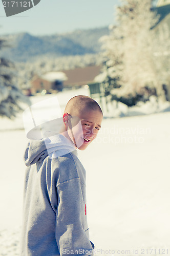 Image of Happy Bald boy in Snow