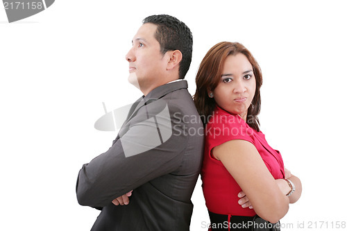 Image of Young couple standing back to back having relationship difficult