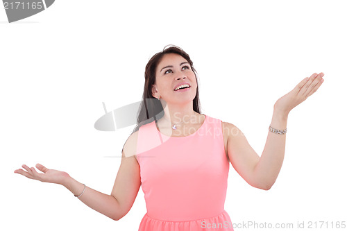 Image of Shocked and excited woman looking up, isolated on white