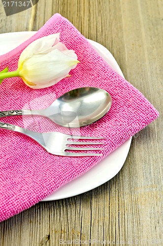 Image of Fork and spoon with white tulips