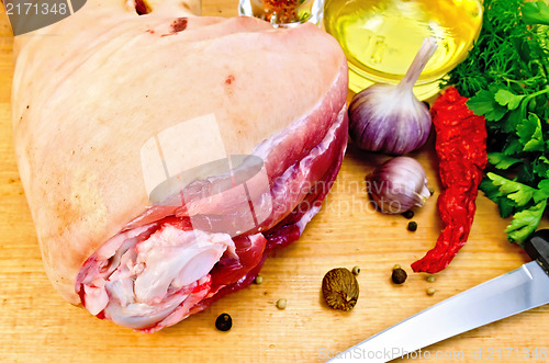 Image of Meat shank with spices on the board