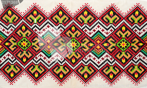 Image of embroidered good by cross-stitch pattern