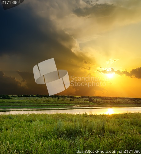 Image of sunset over river