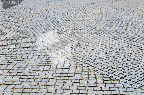 Image of cobbled road as background