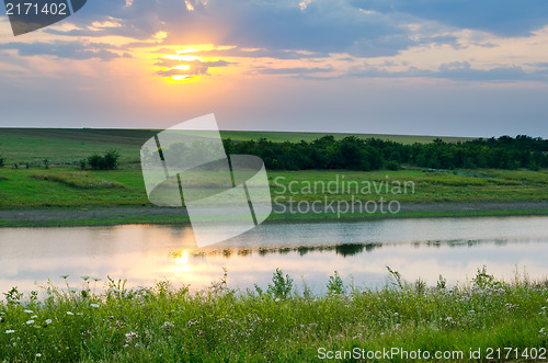 Image of sunset over river