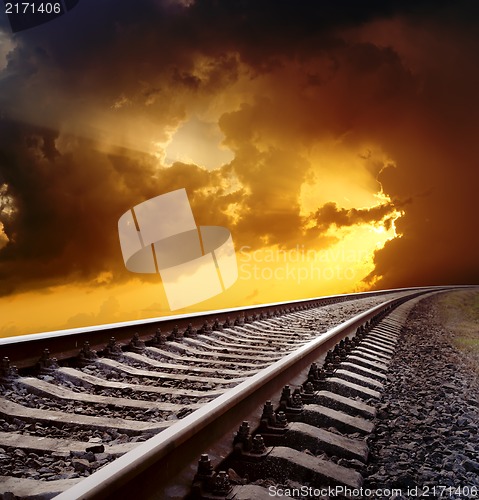 Image of railway to horizon under dramatic sky