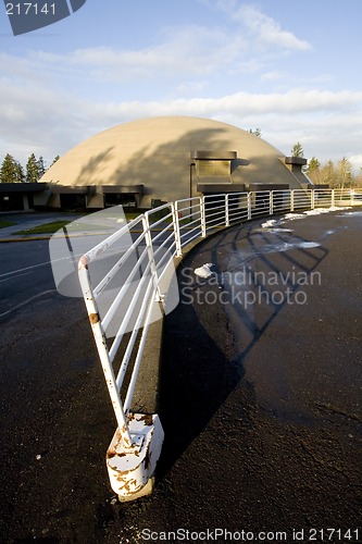 Image of White Fence, Domed Building, and Blue Sky