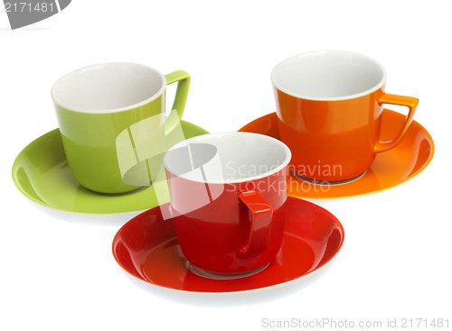 Image of Three multi-coloured cups on a white background