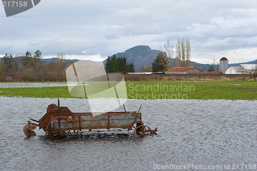 Image of Flooded Antique Farming Equipment 2