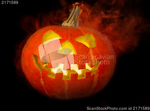 Image of A scary old jack-o-lantern on black.