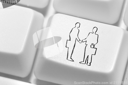 Image of The button with an emblem of hand shake of two businessmen on th