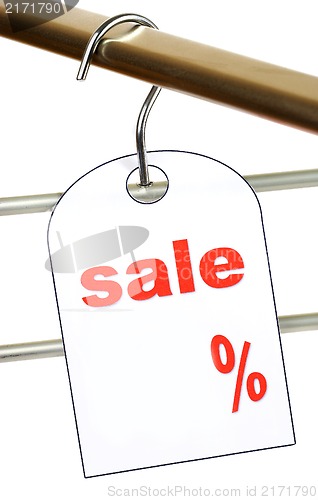 Image of Sale. A hanger with labels on a white background.