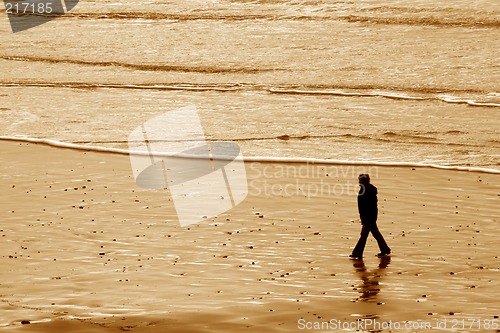 Image of Woman Walking, Indian Beach, Winter