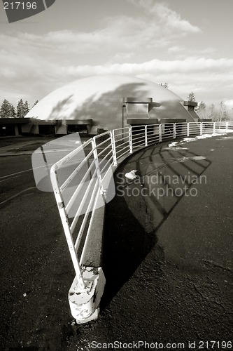 Image of White Fence, Domed Building, and Blue Sky