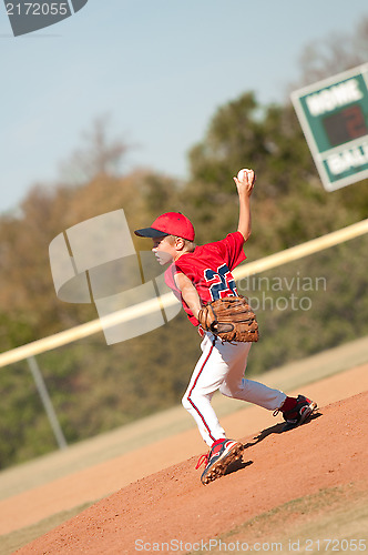 Image of Young baseball pitcher on the mound