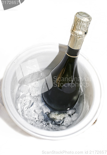 Image of Cold bottle of champagne on ice
