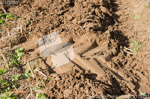 Image of tractor mark trail soil agricultural plow field 