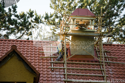 Image of worker men helmet roof tiles construction industry 