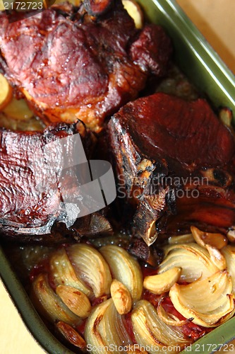 Image of roasted pork knuckle with potatoes