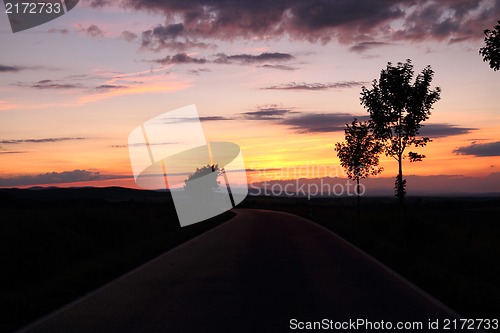 Image of sunset on the road 