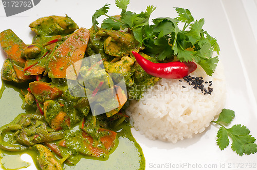 Image of chicken with green curry vegetables and rice