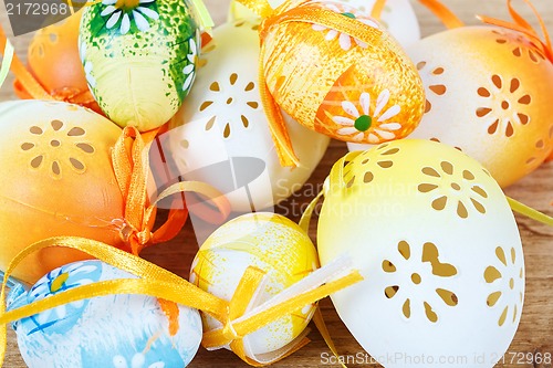 Image of Bright color easter eggs with bows