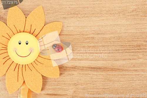 Image of wooden board for spring message with flowers