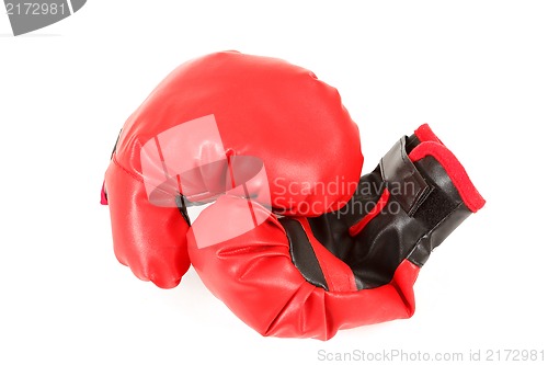 Image of Pair of red leather boxing gloves isolated on white