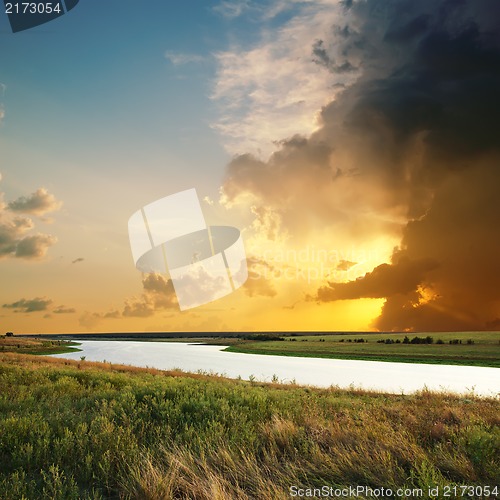 Image of Golden sunset over river