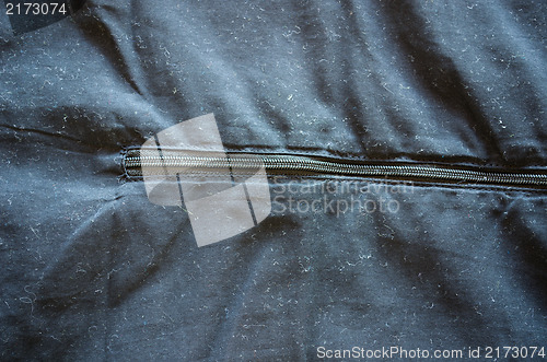 Image of sweatsuit pants fabric and zip closeup background 