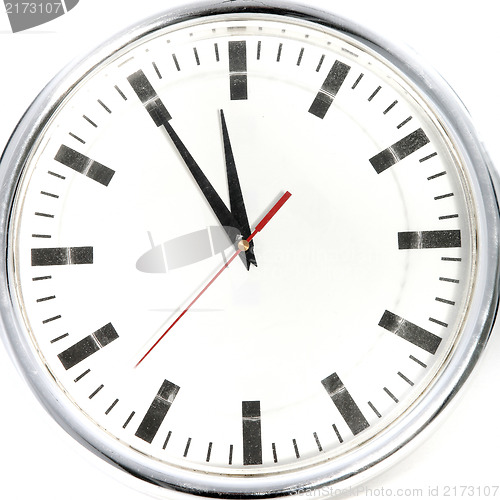 Image of Clock showing five to twelve