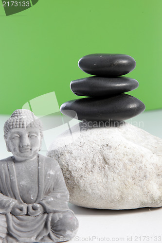 Image of Zen arrangement with spa stones and Buddha statue