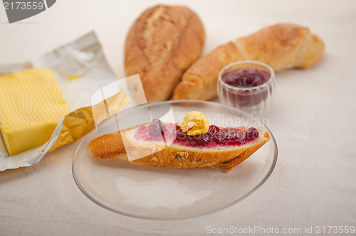 Image of bread butter and jam 
