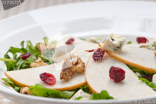 Image of Fresh pears arugula gorgonzola cheese salad