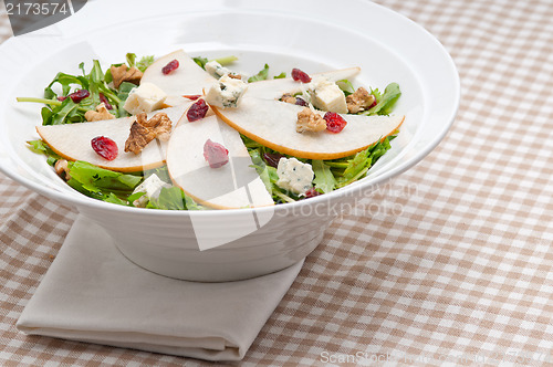 Image of Fresh pears arugula gorgonzola cheese salad