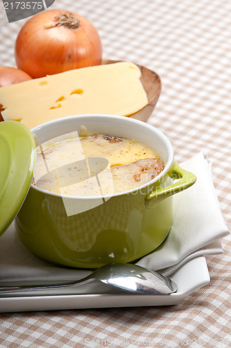 Image of onion soup with melted cheese and bread on top