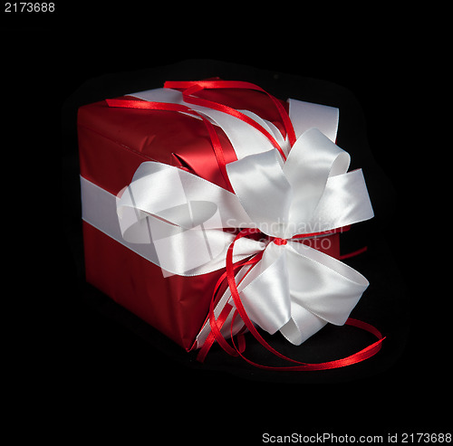 Image of red gift box on black
