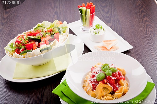 Image of collection of different plates with healthy food