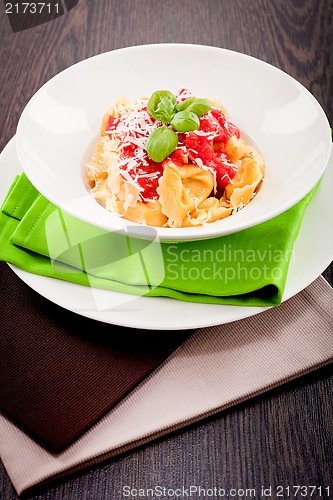 Image of tasty fresh homemade ravioli and tomato sauce