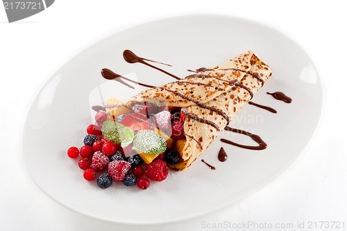 Image of fresh tasty homemade crepe pancake and fruits