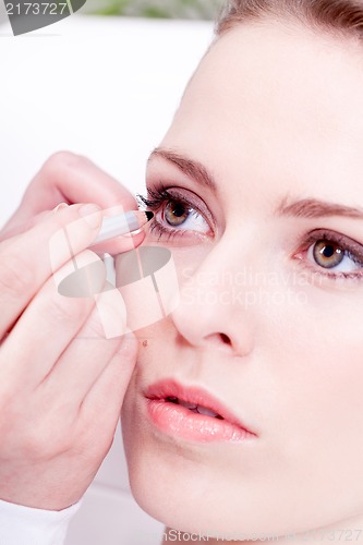 Image of at the cosmetic studio eyeliner on eyes make up